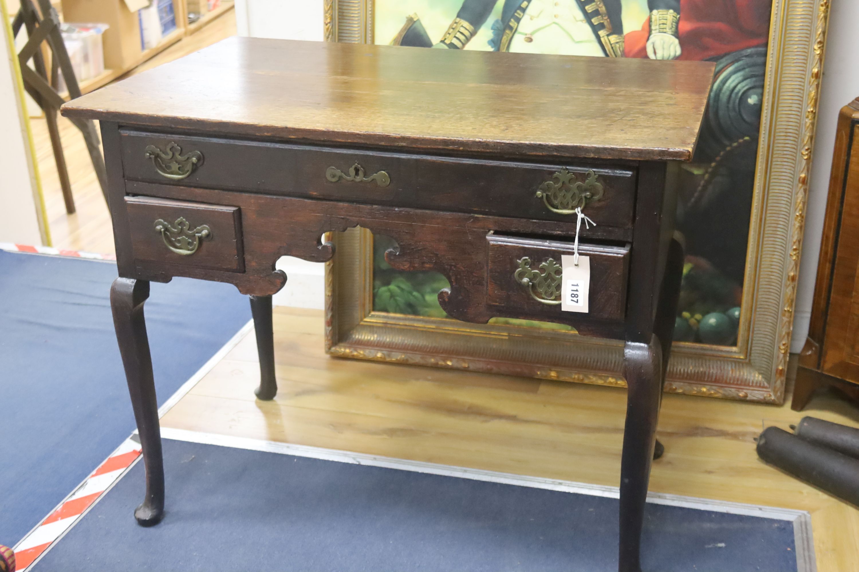 A mid 18th century oak lowboy, with later top, length 83cm, depth 50cm, height 70cm